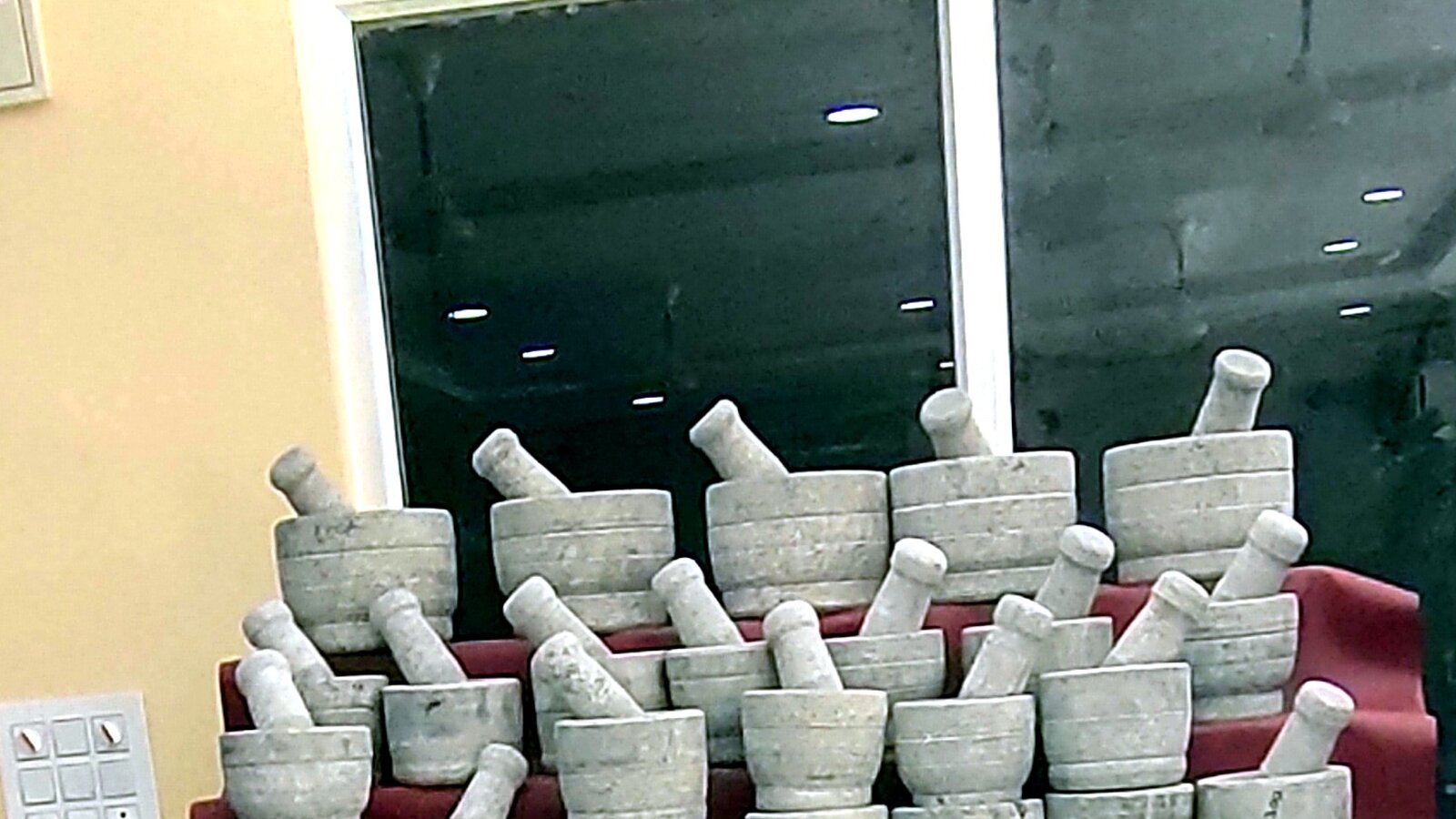 Marble mortar and pestle sets displayed in the shop